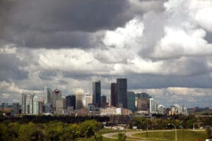 Dark storm clouds over Calgary skyline before a hailstorm